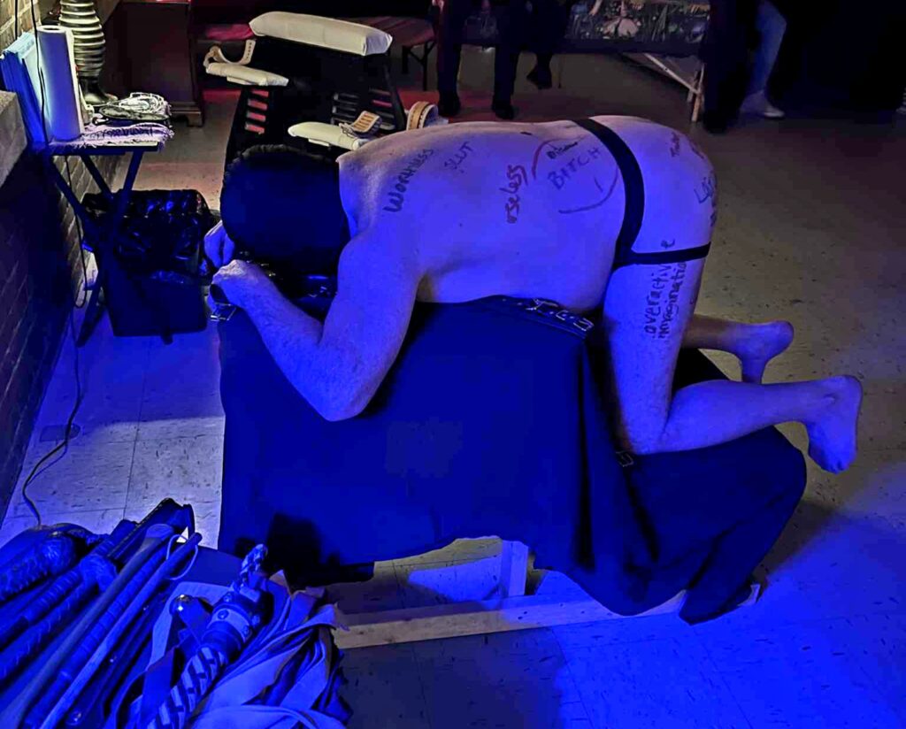 private session photo, bondage, spanking bench, impact, hood, humiliation